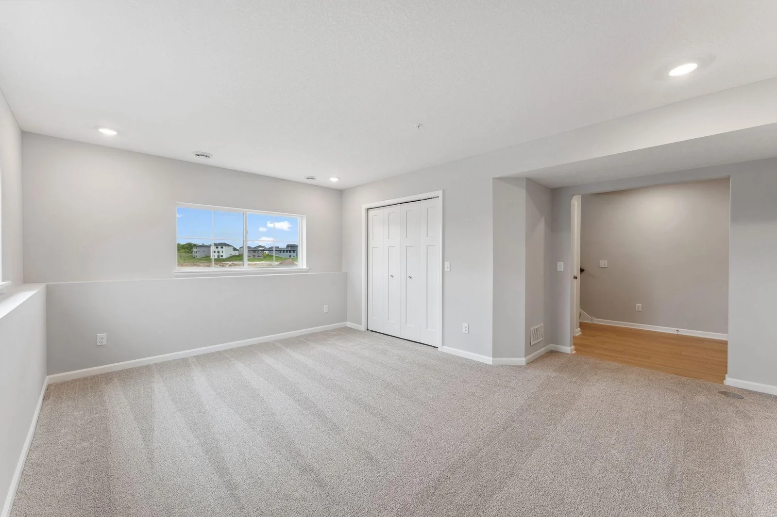Lower level rec room, plenty of natural light!