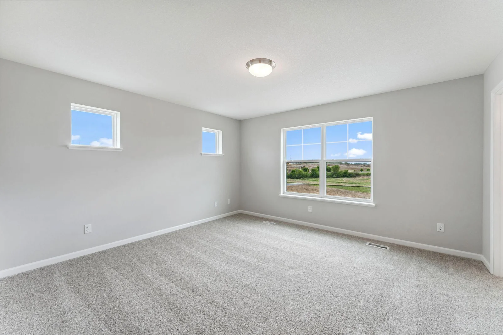 Owner's bedroom with plenty of natural light