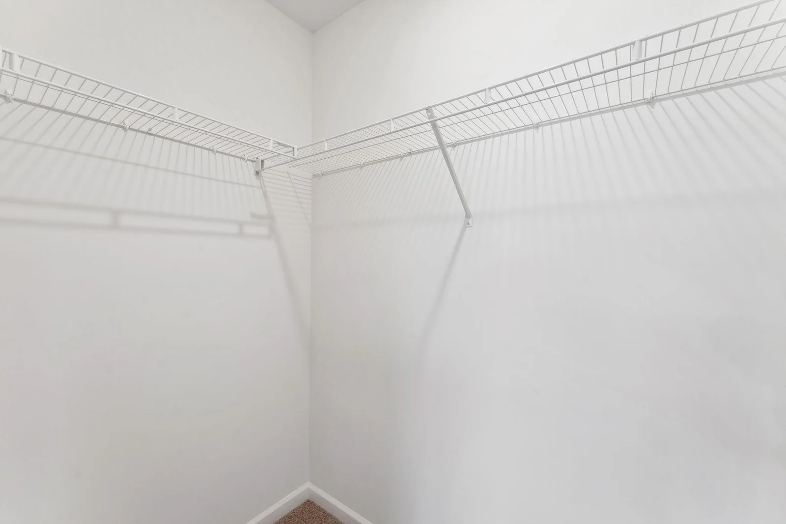 One of 2 closets in owner's suite