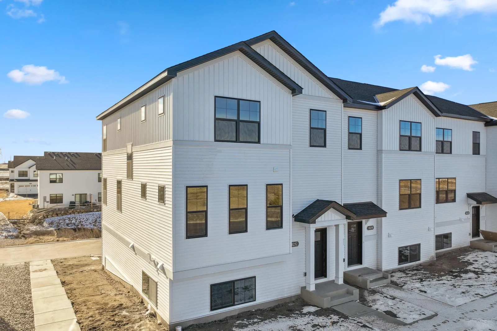 End unit with tons of windows!