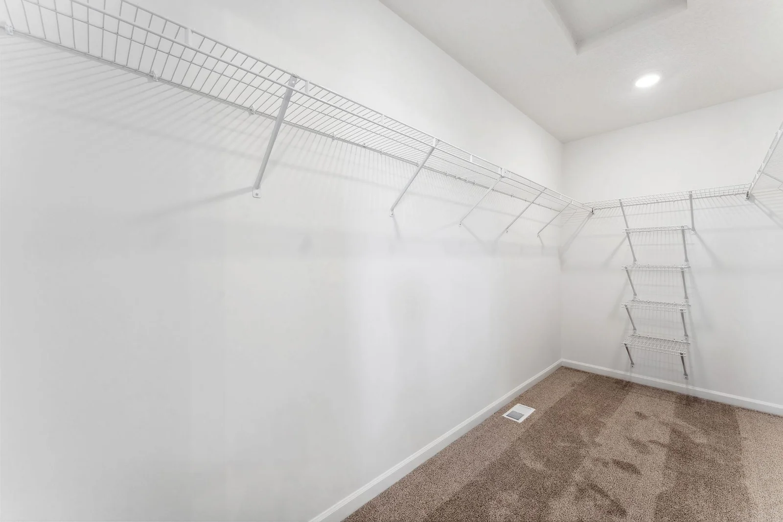 Owner's walk-in closet