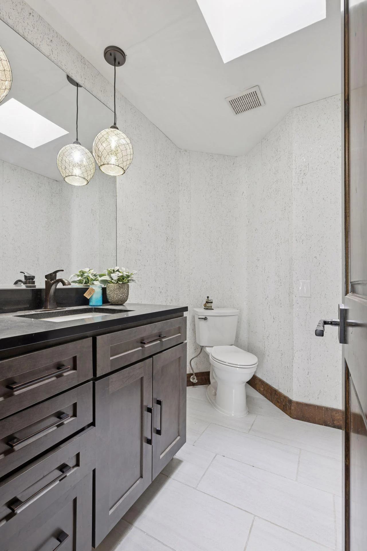 Main floor powder bath is just off the entry.