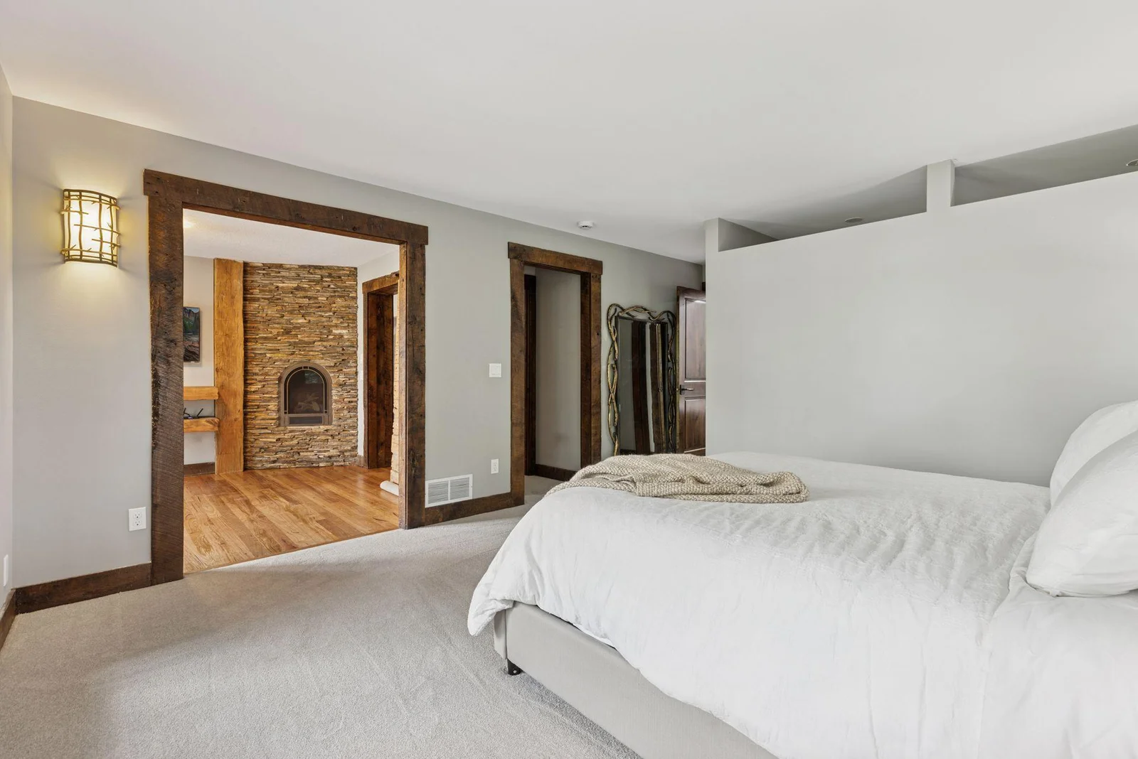 Enjoy a sitting room off the main-floor primary bedroom. Snuggle up to the gas fireplace and binge your favorite shows.