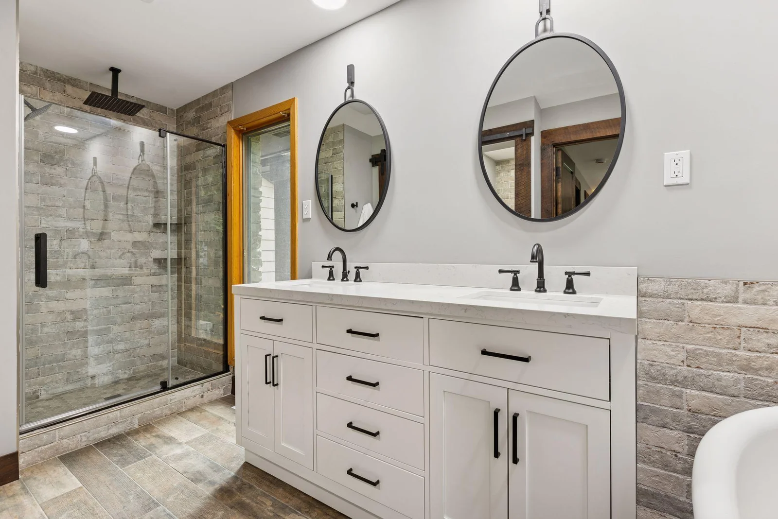Double sinks in main-floor primary ensuite bathroom
