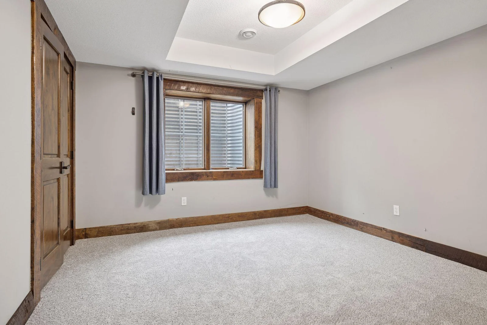 One of three lower level bedrooms