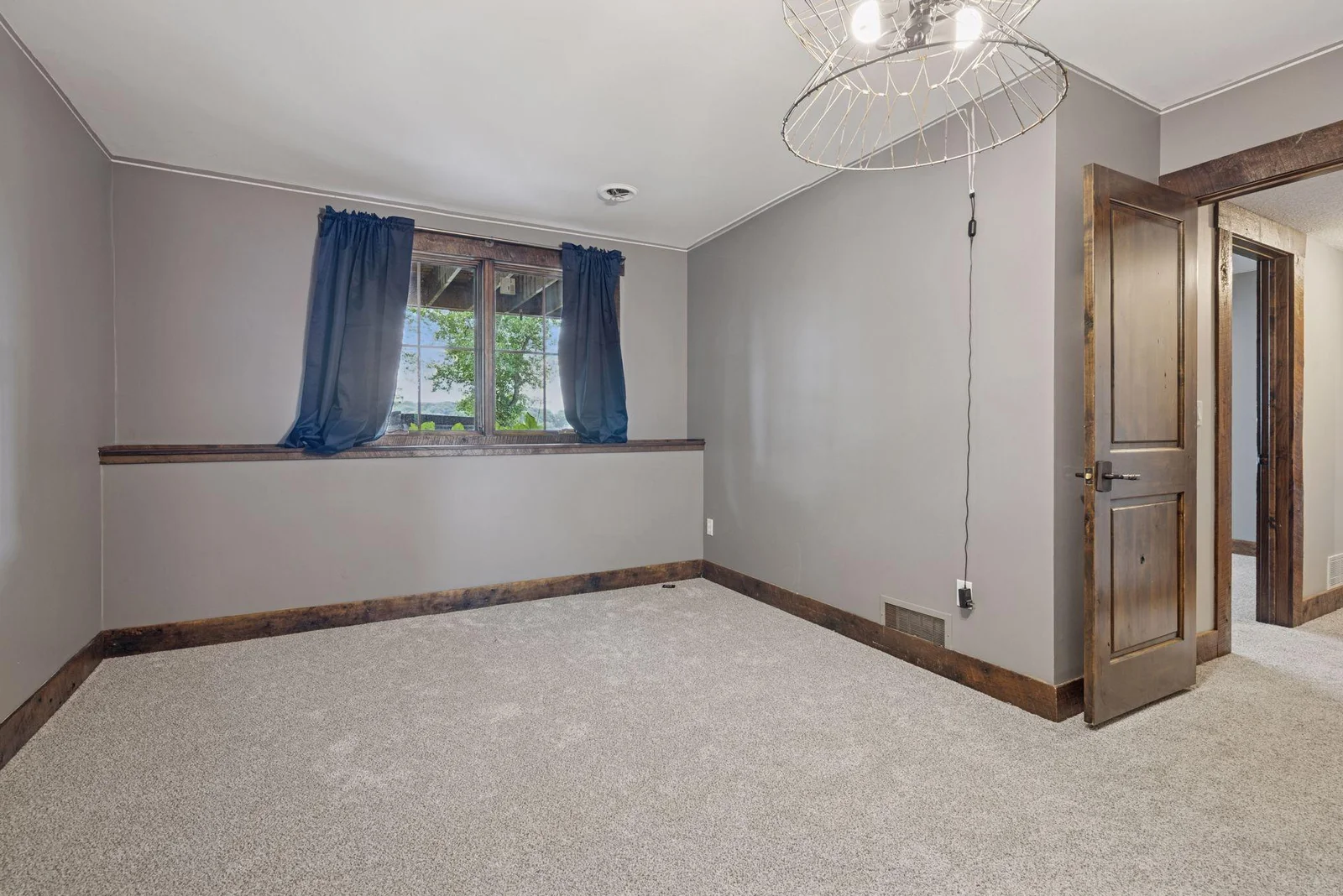 One of three lower-level bedrooms.