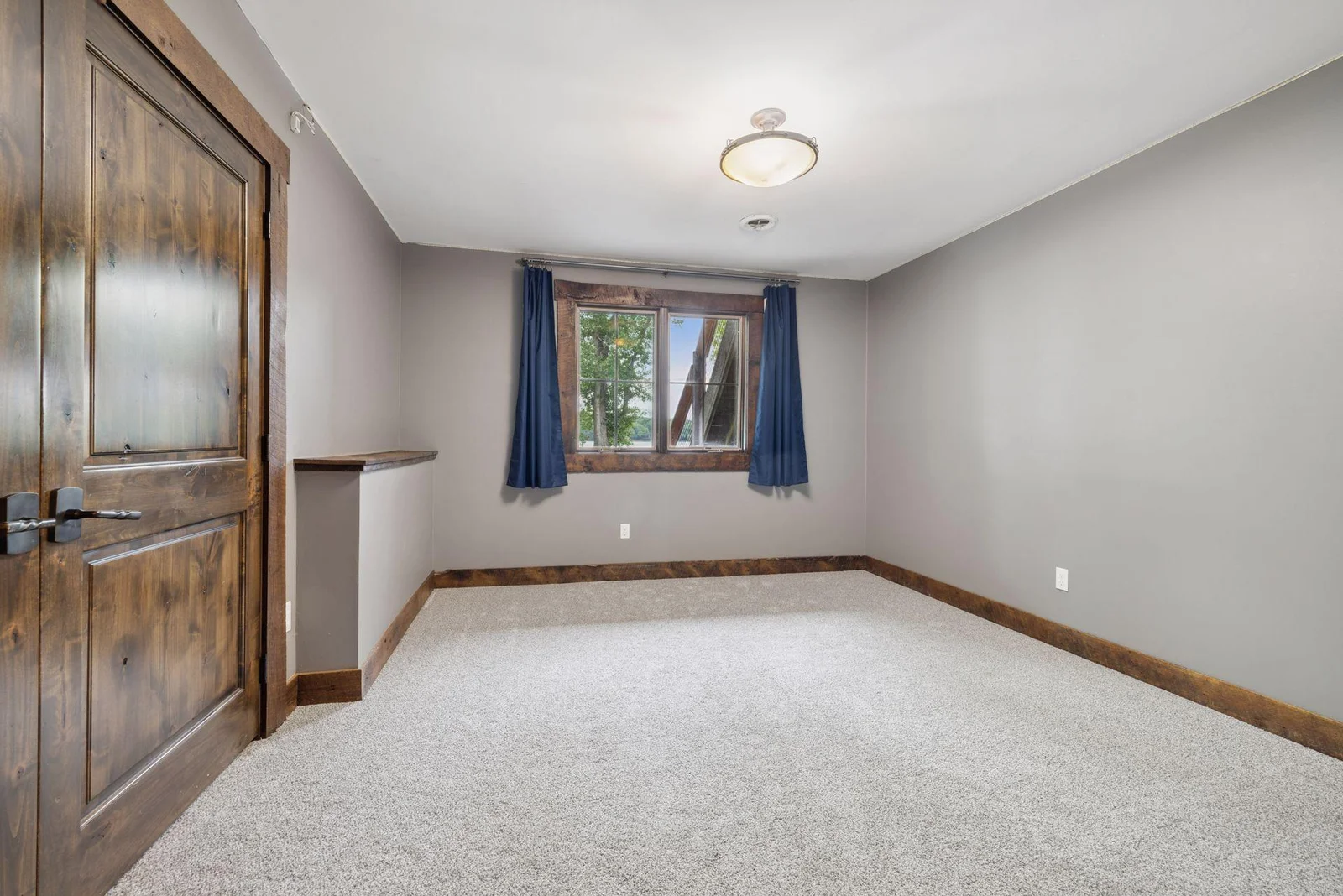 One of three lower level bedrooms