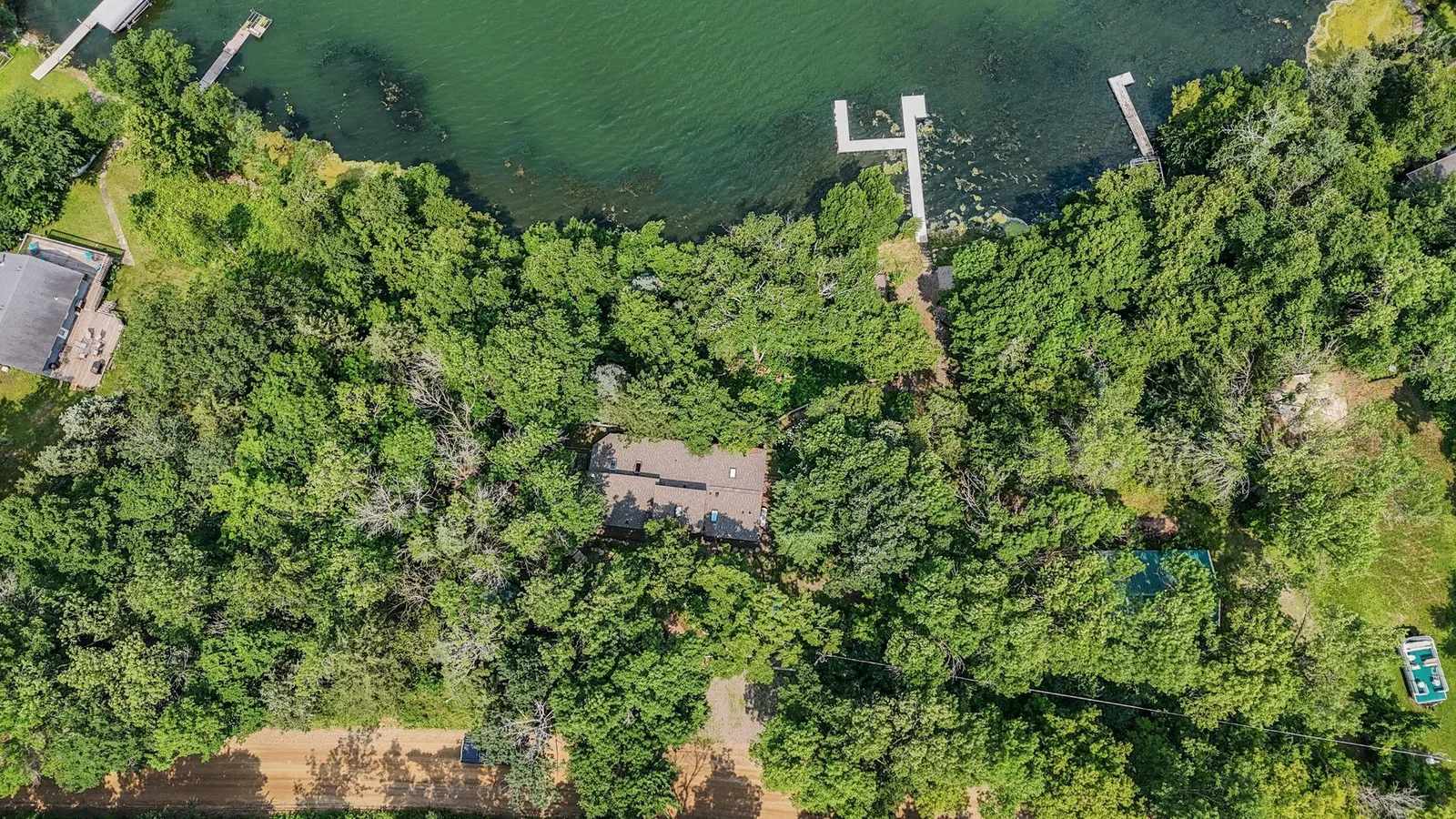 Nearly 1 acre of wooded privacy!