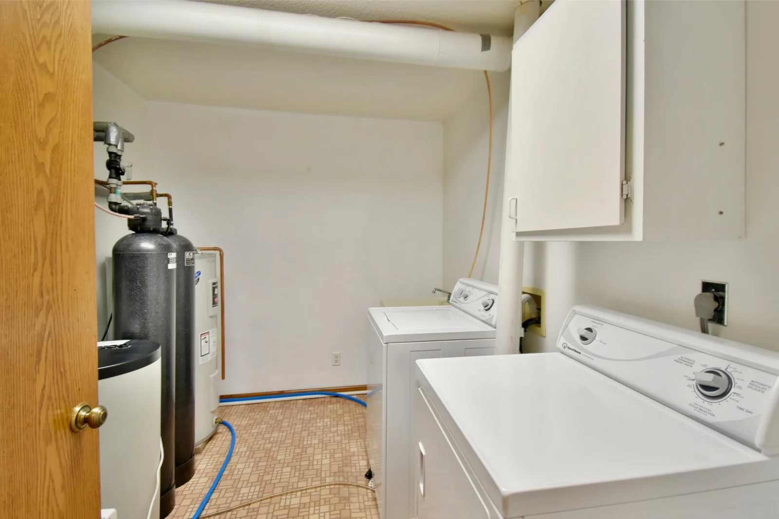 Laundry room with utilities