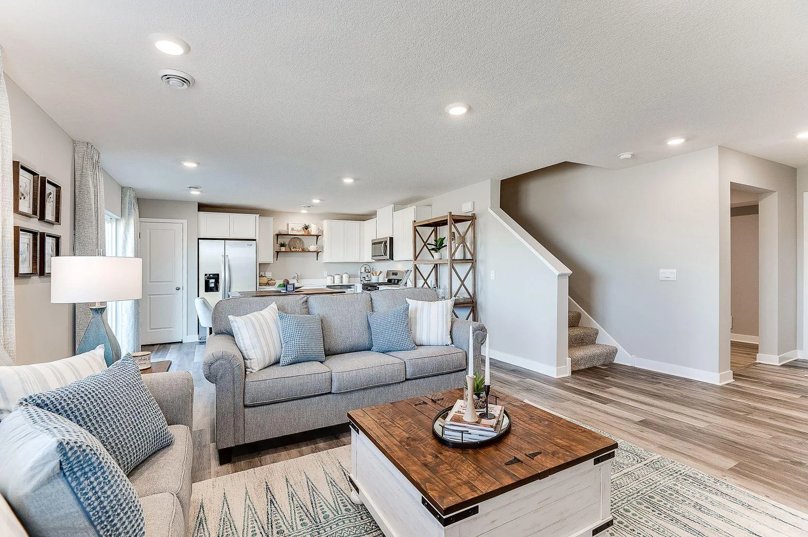 Enjoy the natural light in your truly open living space. (Model photo, colors may vary)