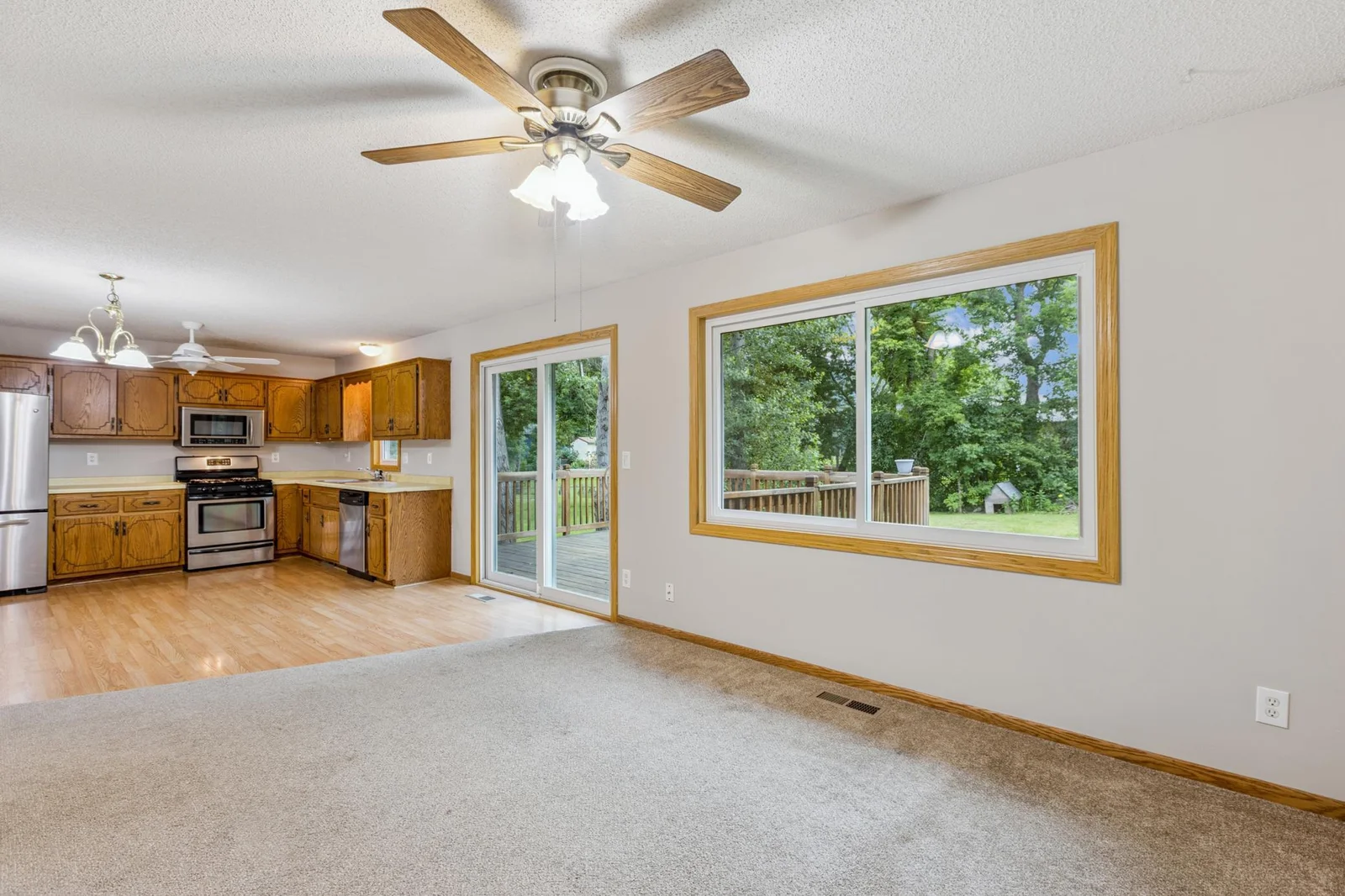 The large windows provide ample natural light in the upper level.