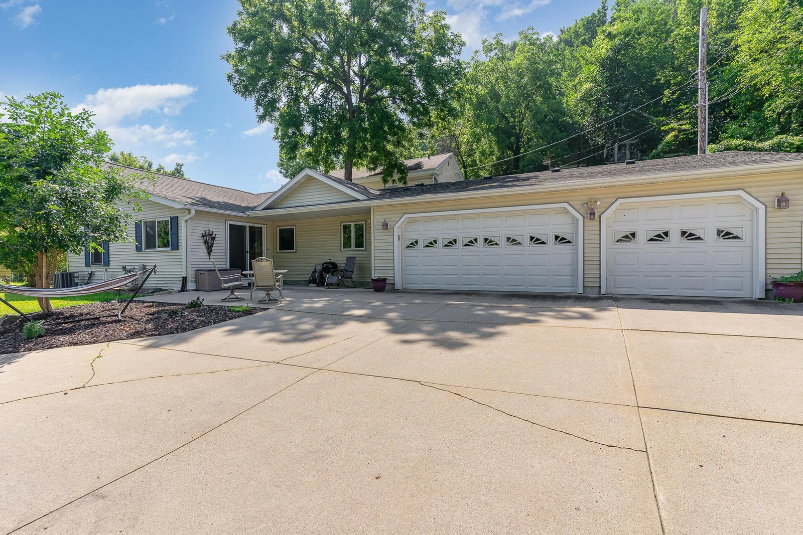 Front Exterior + 3 Car Garage