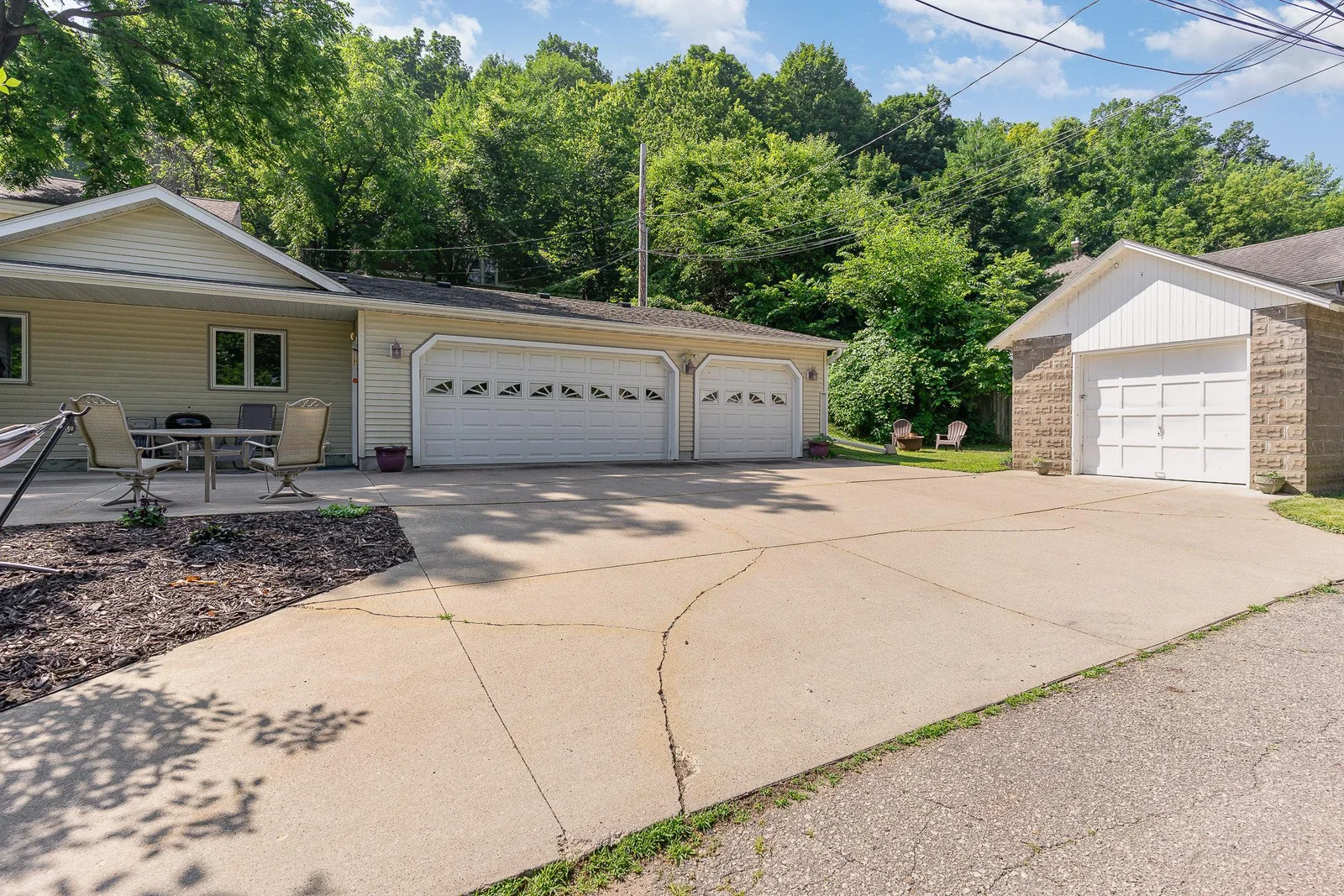3 Car Garage + Patio &  Large Driveway