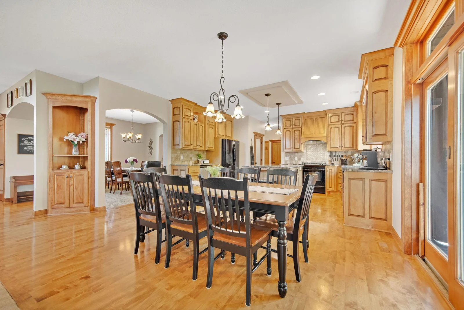 Informal dining room has a sliding door leading to the 3 season porch.