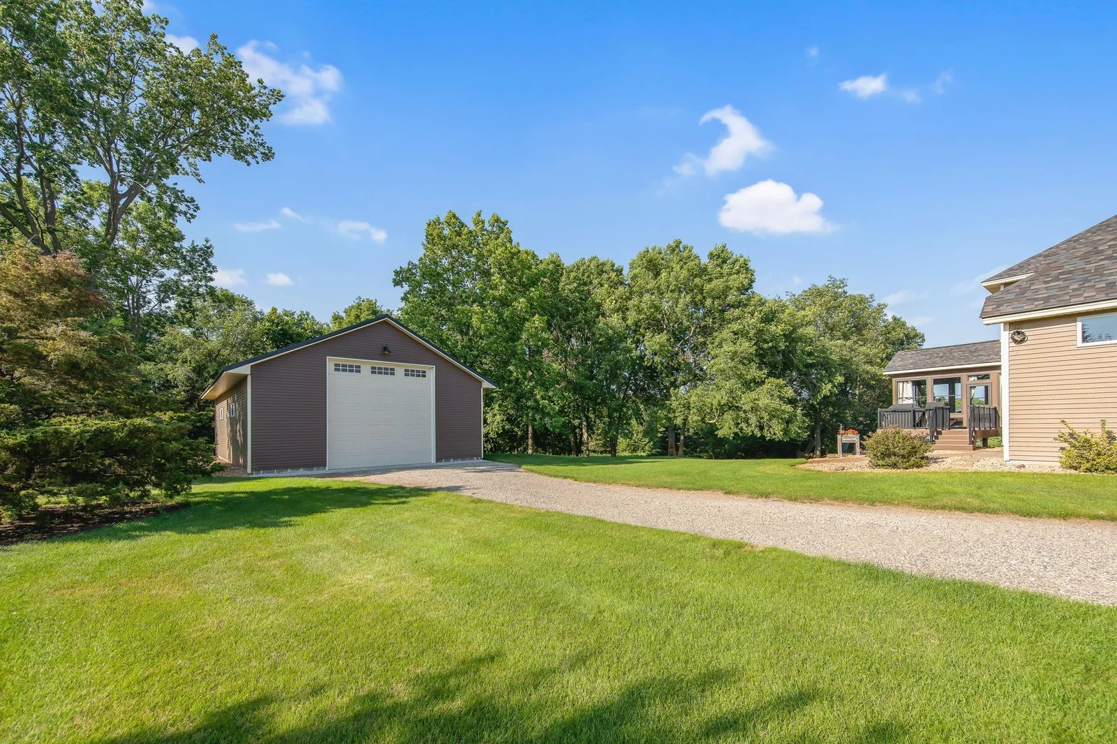 Separate drive leads to the detached 30x50 shop! Featuring 14 foot garage door!