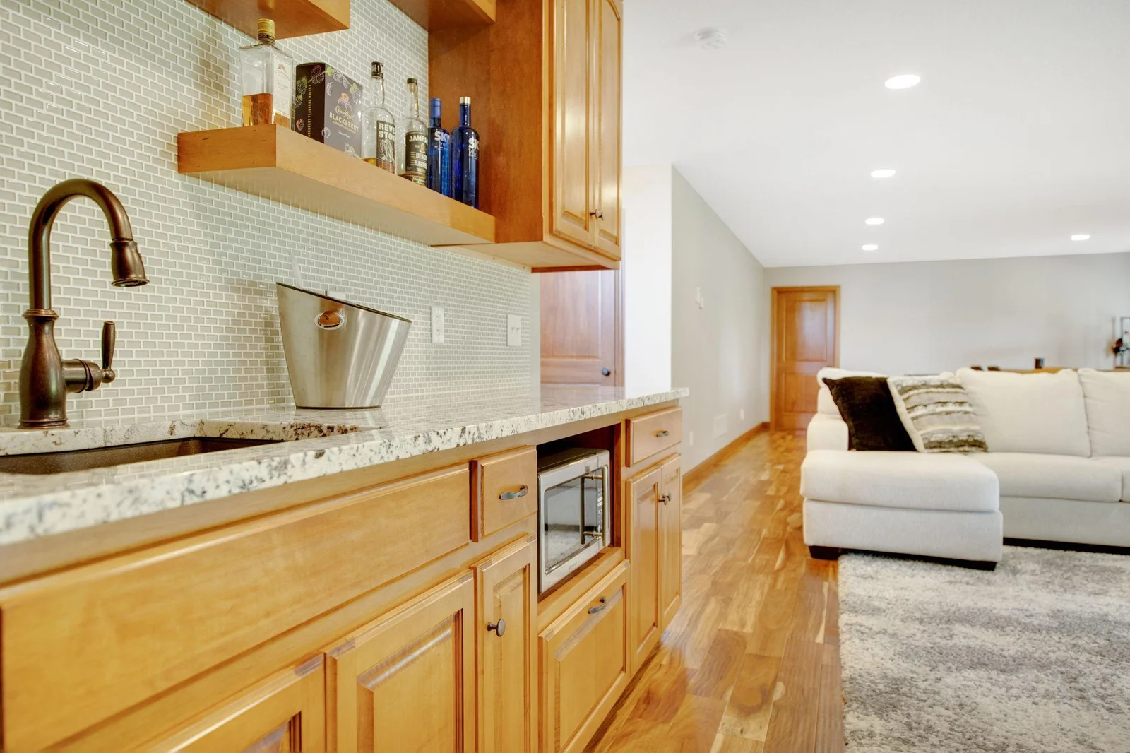 Full refrigerator, granite countertops, and tile backsplash!