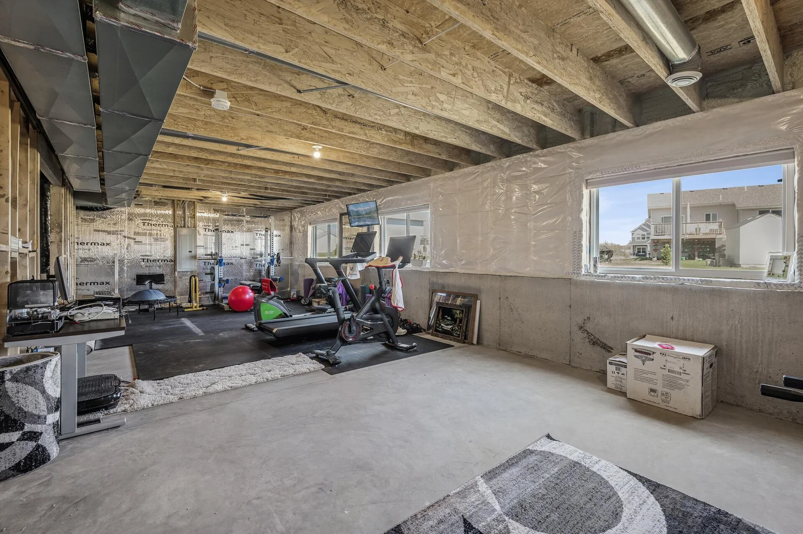 Unfinished Basement with lookout windows