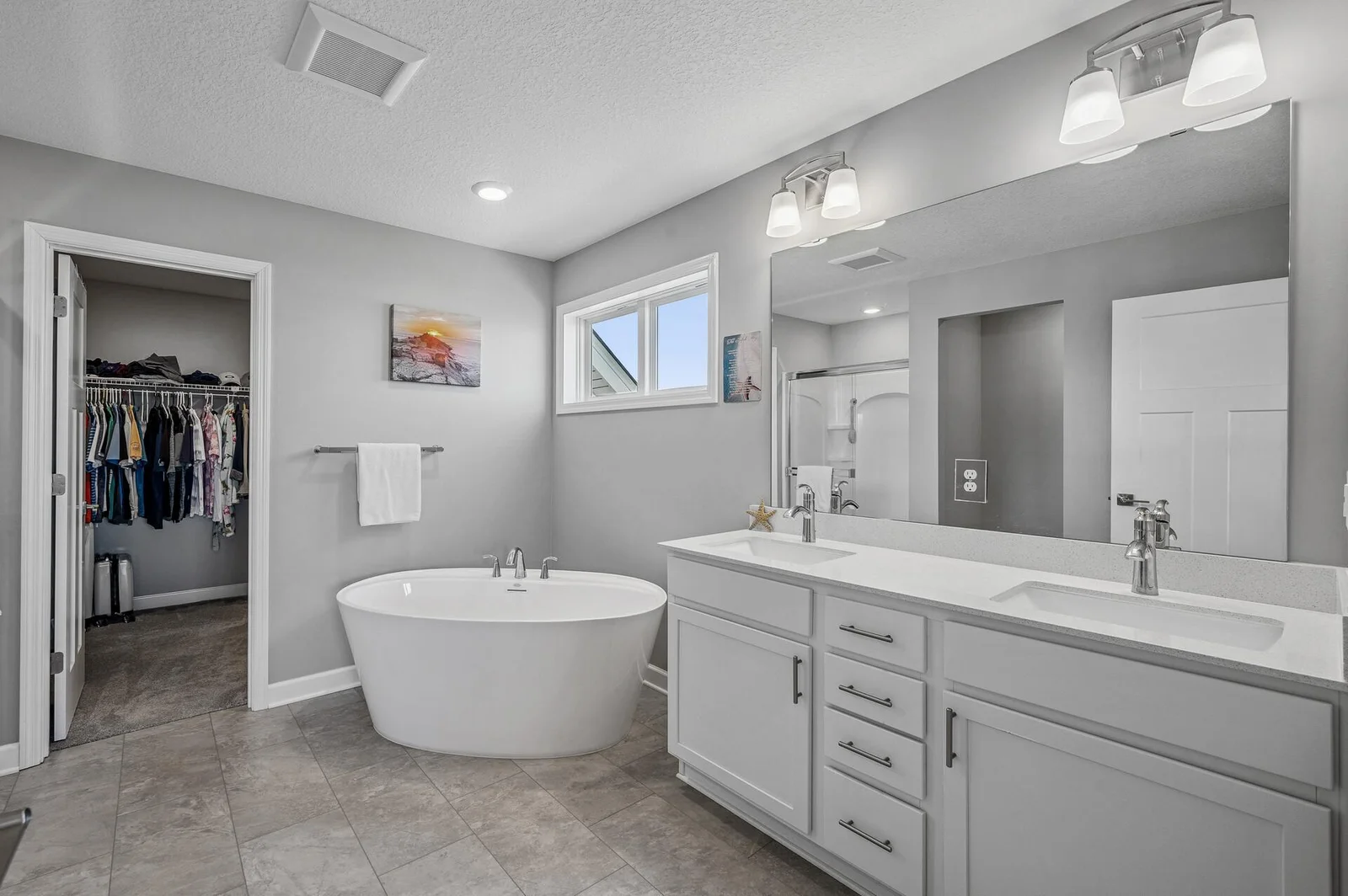 Primary bath with double vanity and soaking tub
