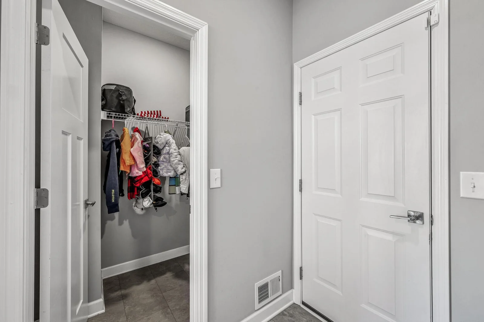 Entry from garage has sizeable walk-in closet and large landing area