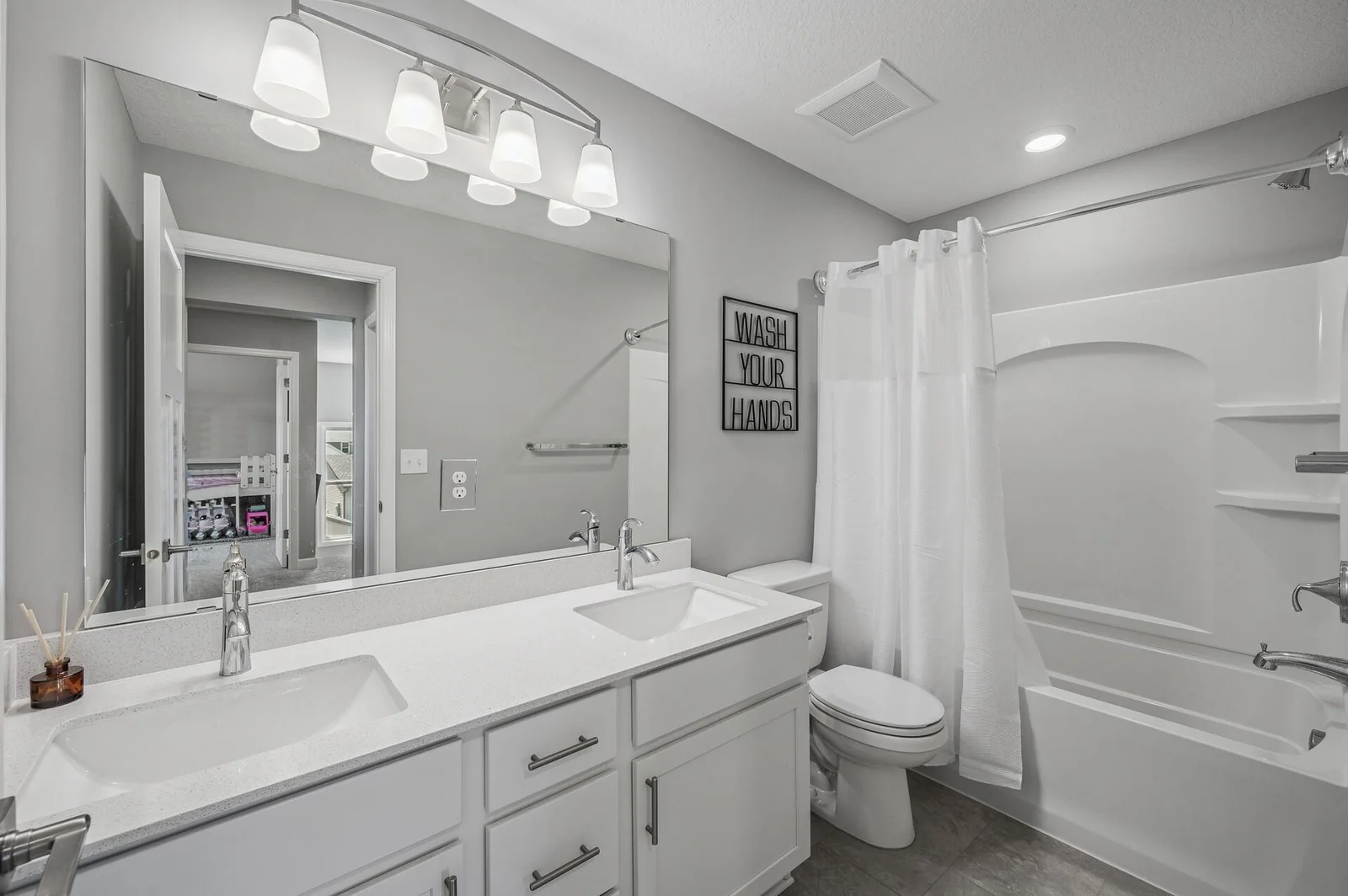 Upstairs main full bath with double vanity