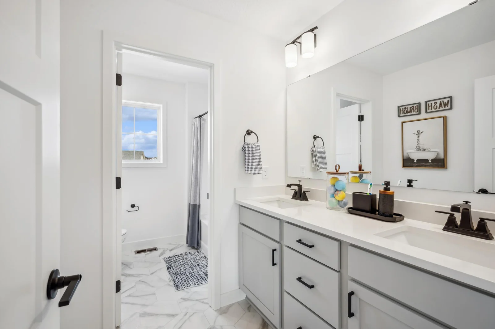 Hall Bath - *Photo from a previously completed Brookview - finishes and selections will vary.