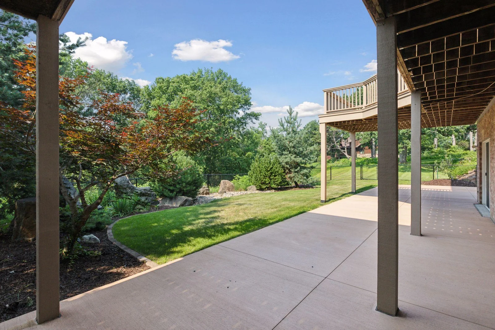 Walkout to the fully fenced, private backyard nestled in with the Zen garden