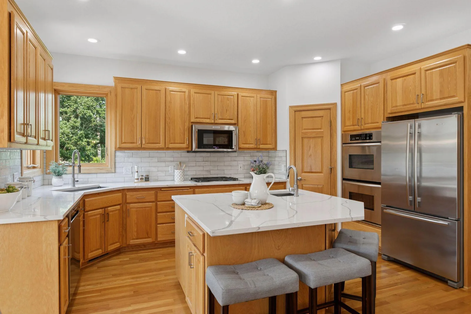Kitchen remodel in 2024 added quartz counters, soft close cabinet doors and drawers, new sinks, and a new ultra-quiet microwave with exterior venting