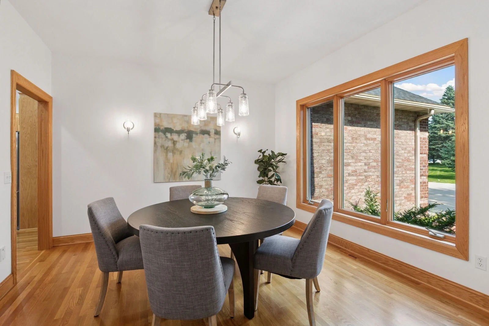 Natural, private views to the front yard as you dine with family