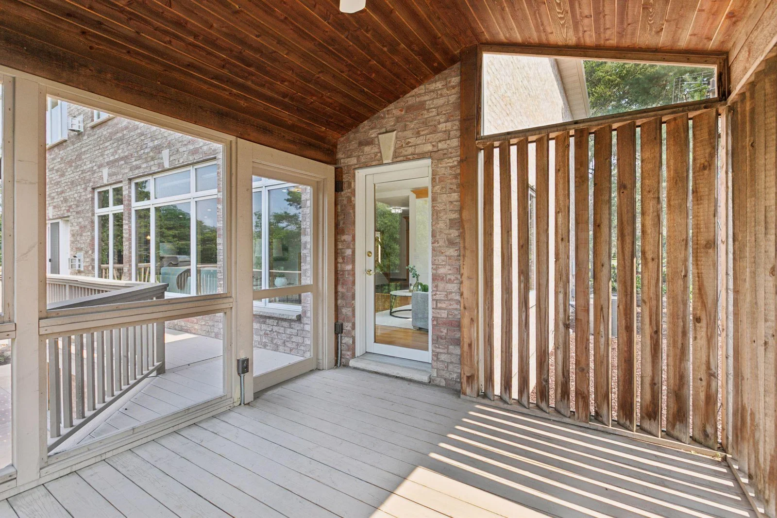A private three-season porch in a great location off the living room