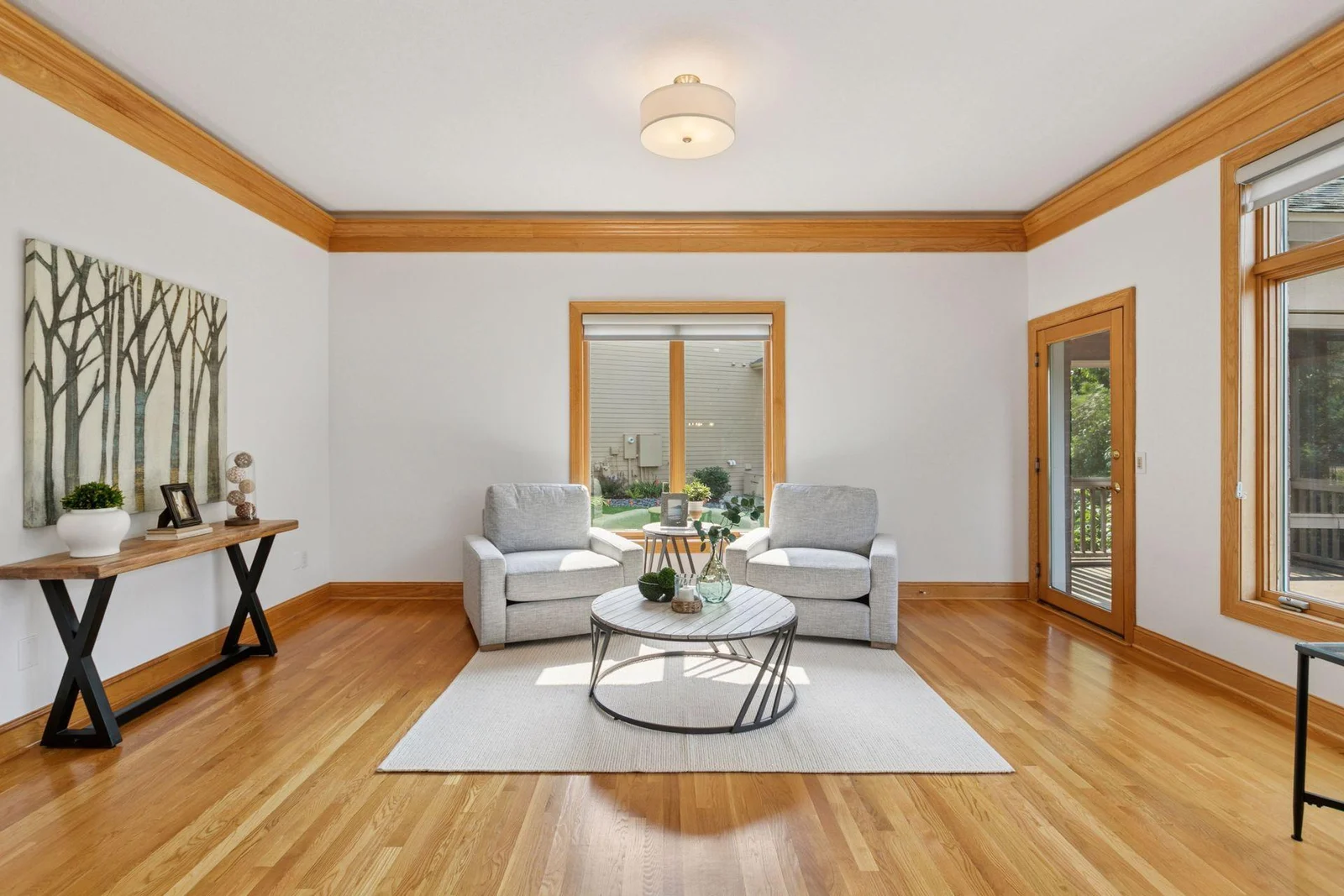 The warm tones and natural textures of this living room make it the perfect place to relax in the evenings