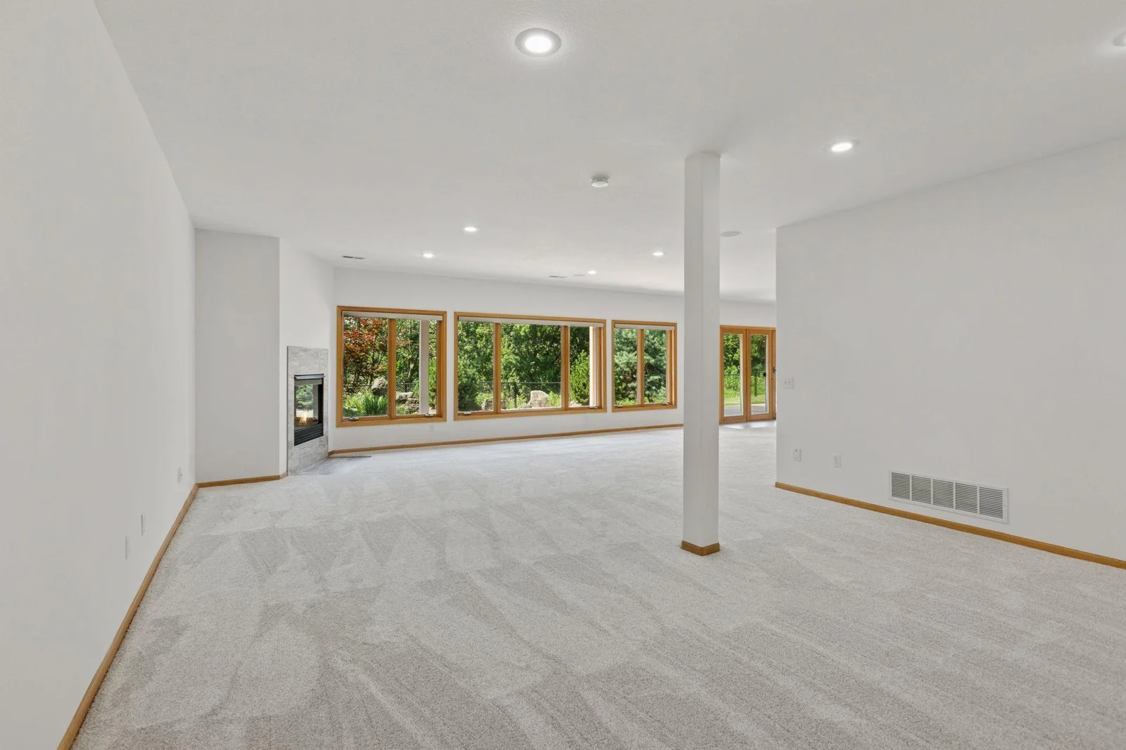 Wall of windows that walkout directly to your private oasis