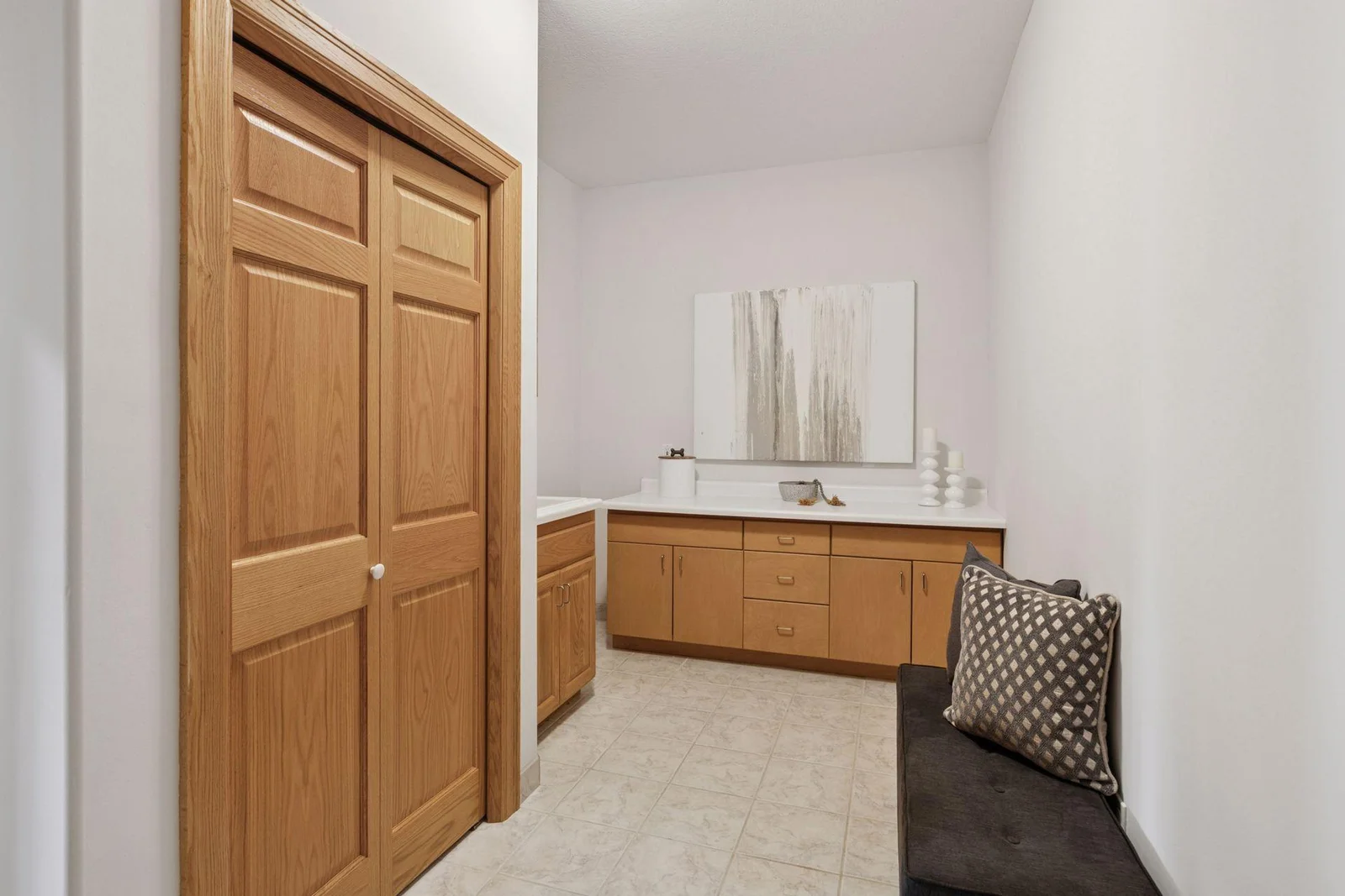 Mudroom from garage: spacious with sink