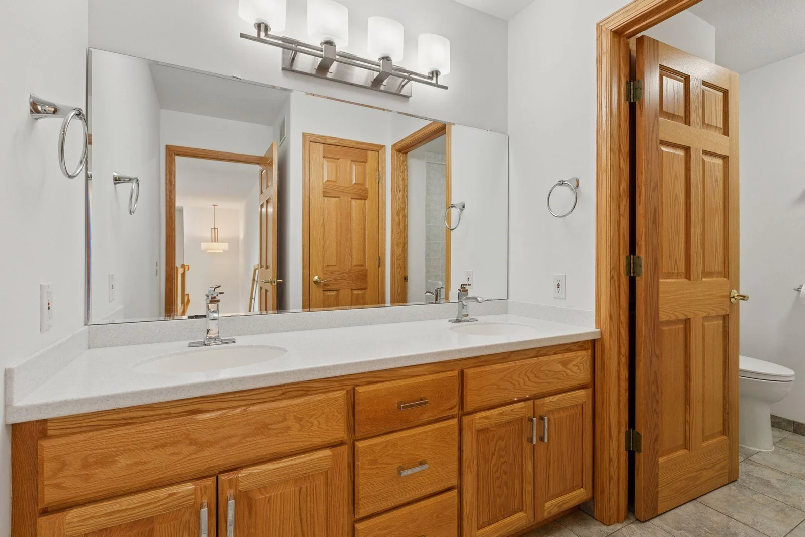 Upper level full bath with double vanity