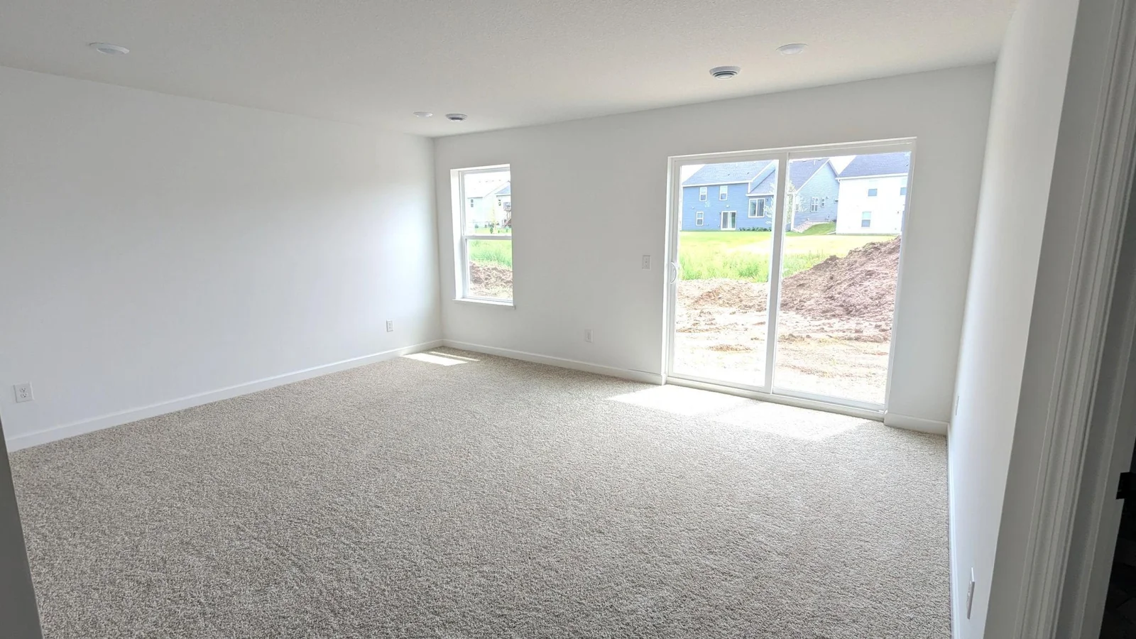 Photo of the actual home as of 6.29! The finished walkout basement is perfect for entertaining or unwinding.