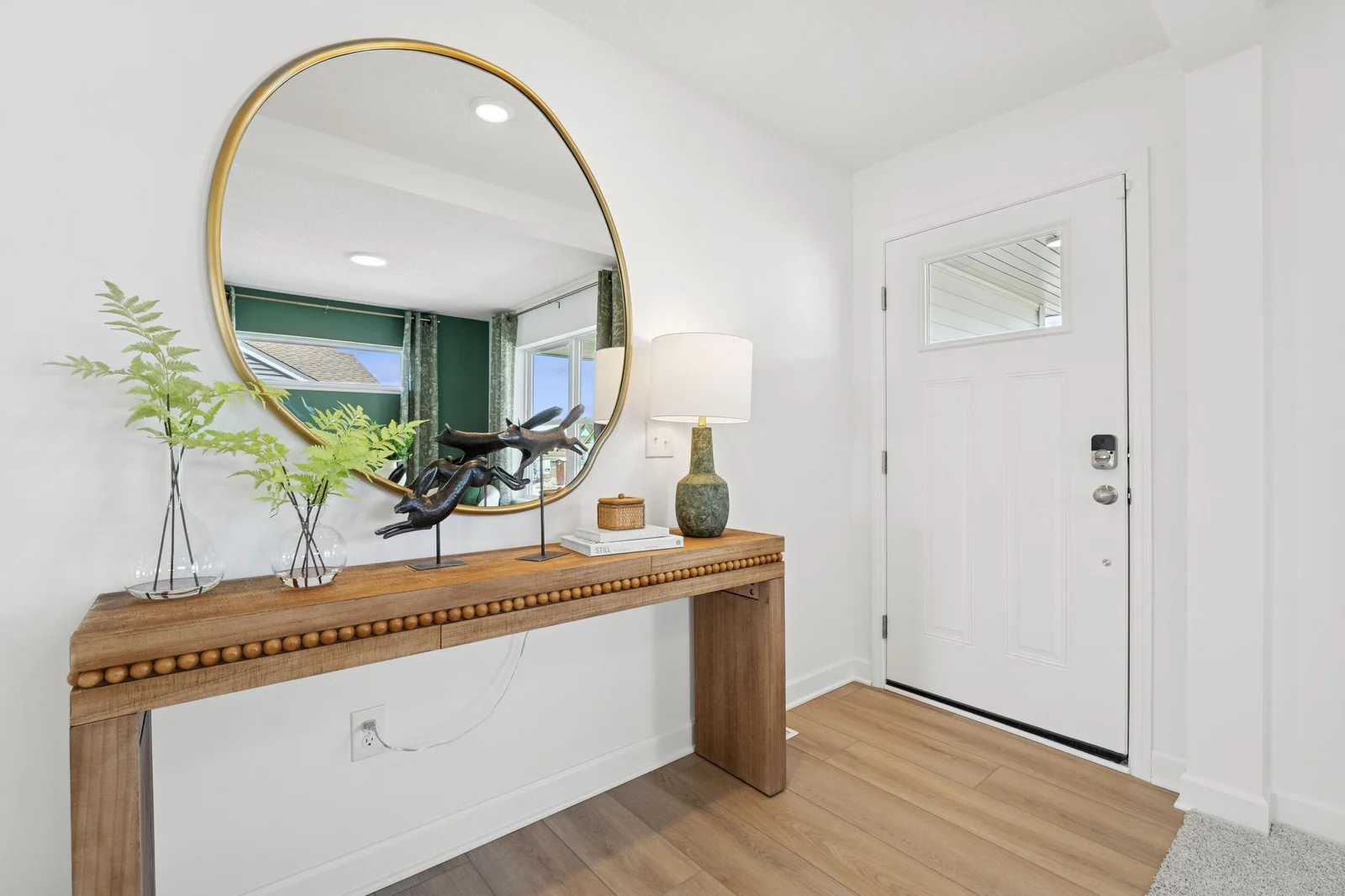 (Photo of a model home. Finishes and features will vary) The welcoming foyer!