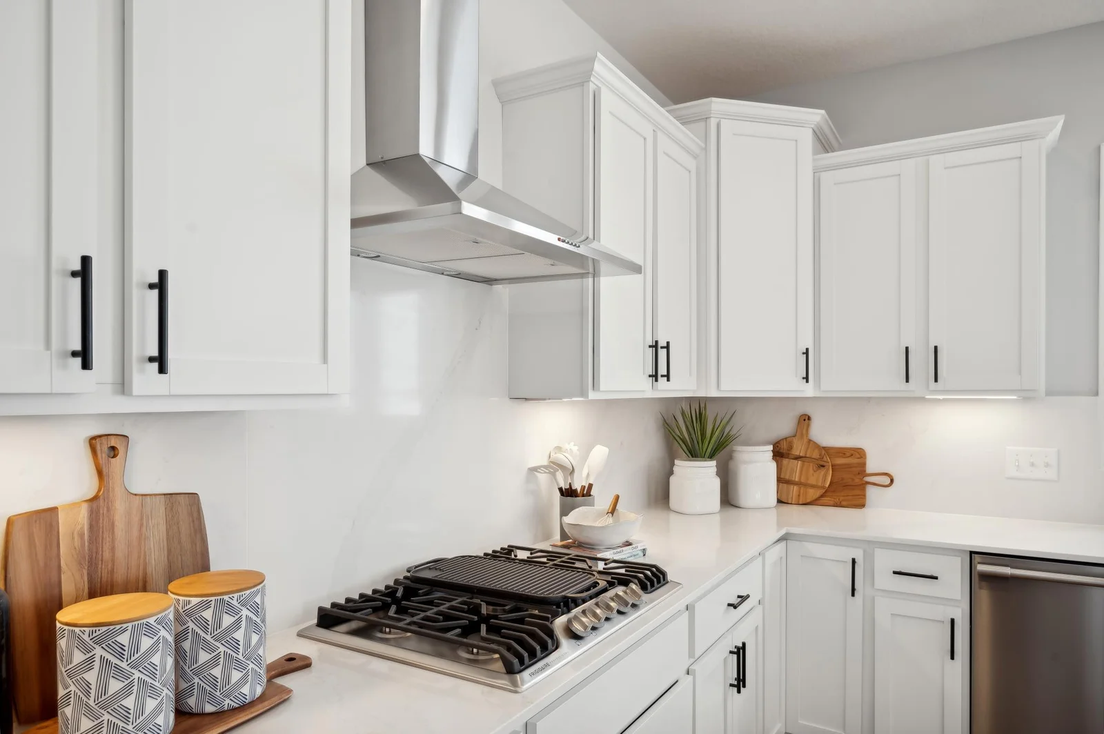 (Photo of a decorated model, actual homes finishes will vary) What a stunning kitchen!