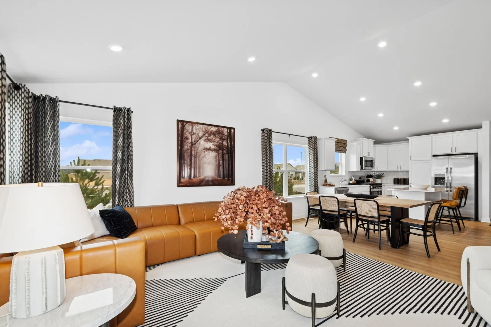 *Photo of model home, actual features may vary. The main level seamlessly transitions from room to room while maintaining an open-concept layout throughout.