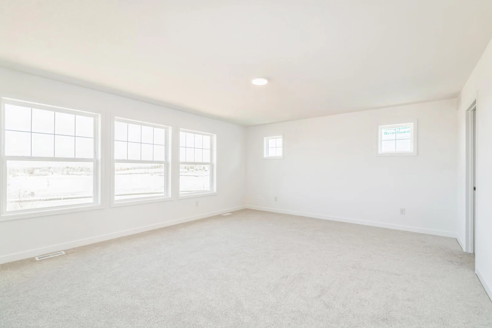 Photo is of the actual home. Find your retreat in this primary bedroom. Enjoy the exclusivity of a private bath and two walk-in closets.