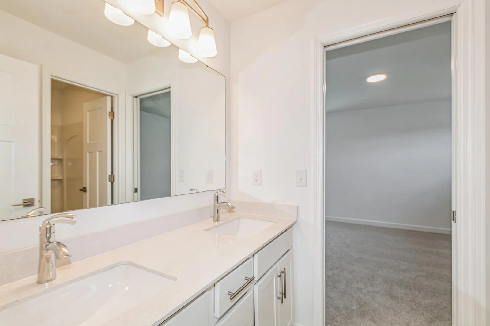 Photo is of the actual home. This Jack and Jill bath connects two of the secondary bedrooms.