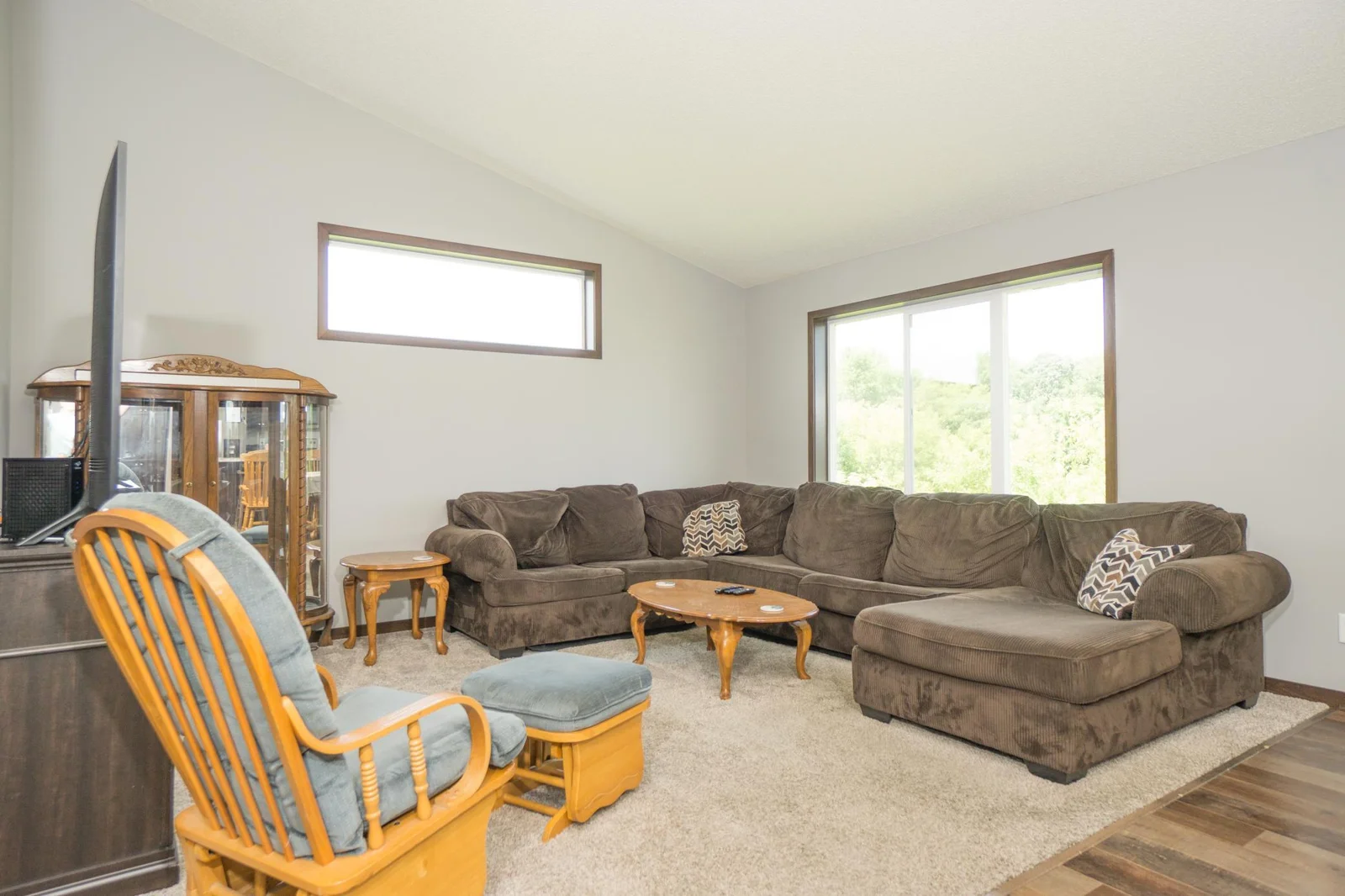 Living room over looks the backyard & is adjacent to thee dining room