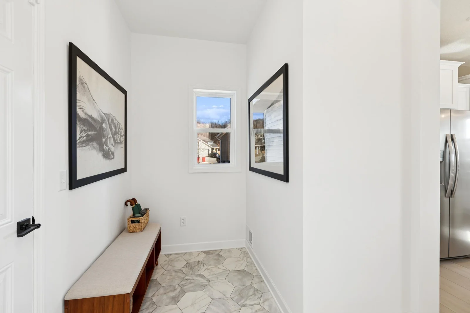 (Photo of a decorated model home, features and finishings will vary) Another view of the mudroom