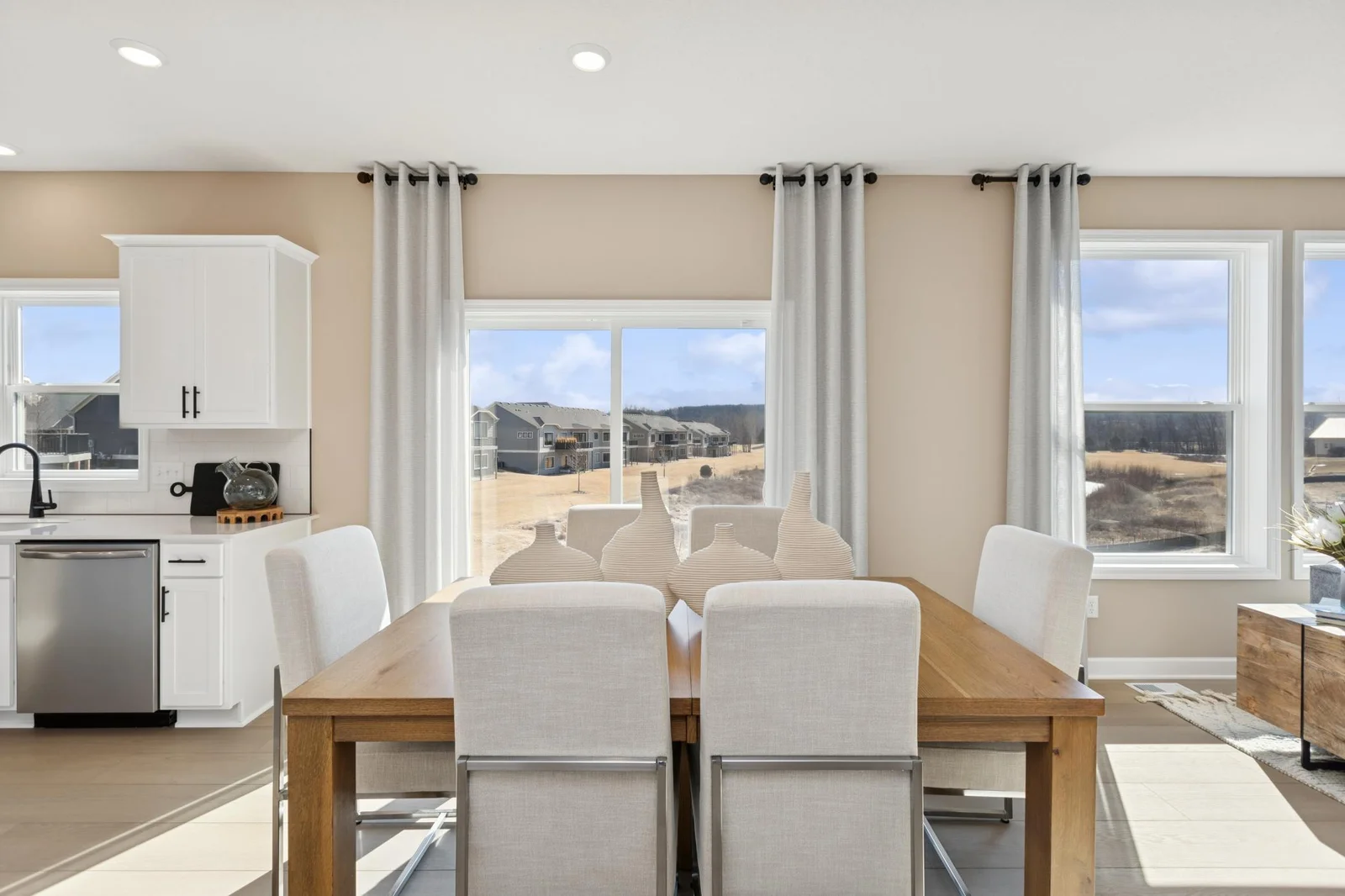 (Photo of a decorated model home, features and finishings will vary) Plenty of natural lighting while dining!