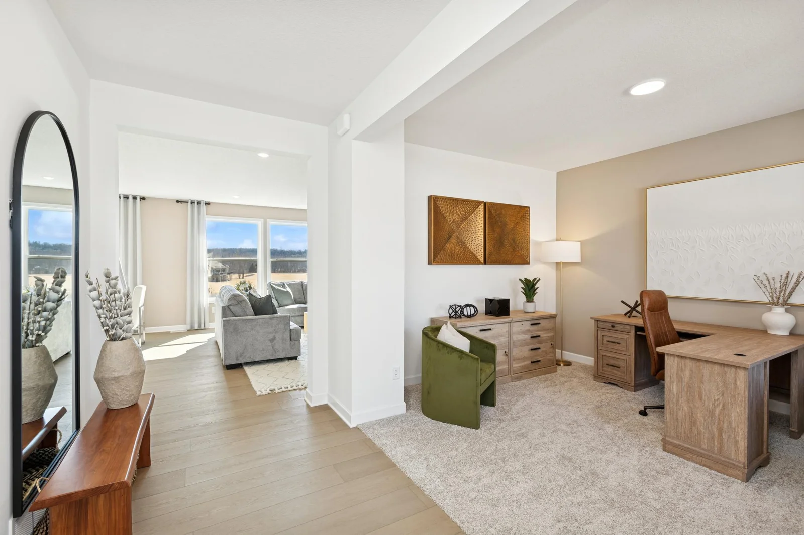 (Photo of a decorated model home, features and finishings will vary) The flex room located at the front of the home.