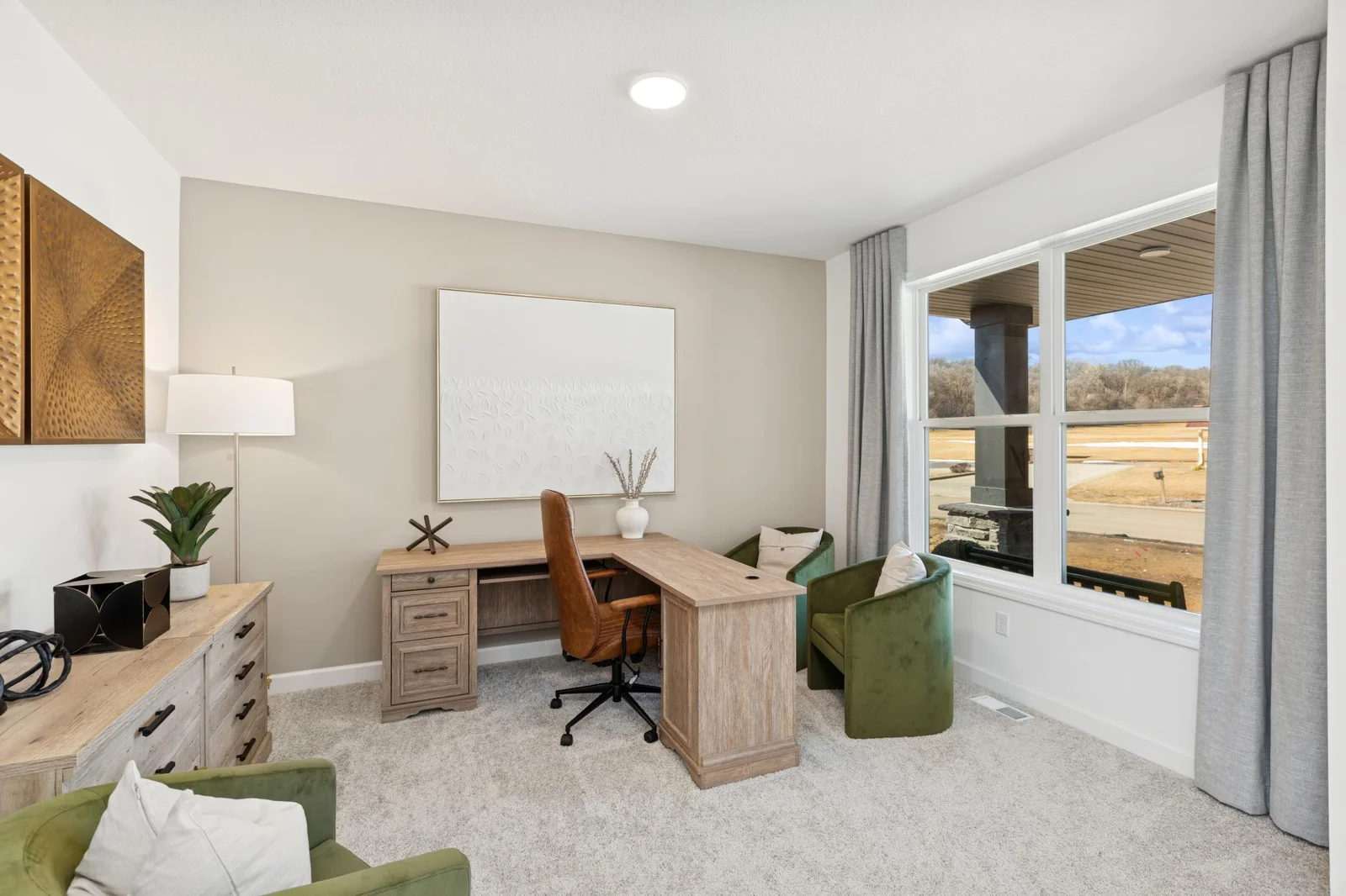 (Photo of a decorated model home, features and finishings will vary) The flex room can be used as an office, play space, or living space; the possibilities are endless!