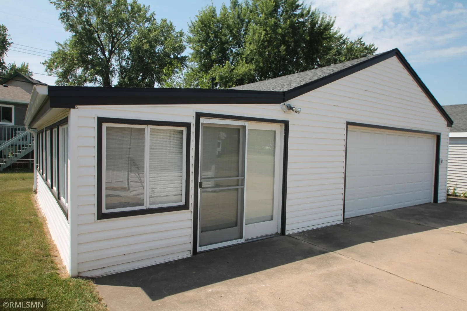 Awesome porch addition measures 26 x 11 with lots of windows.