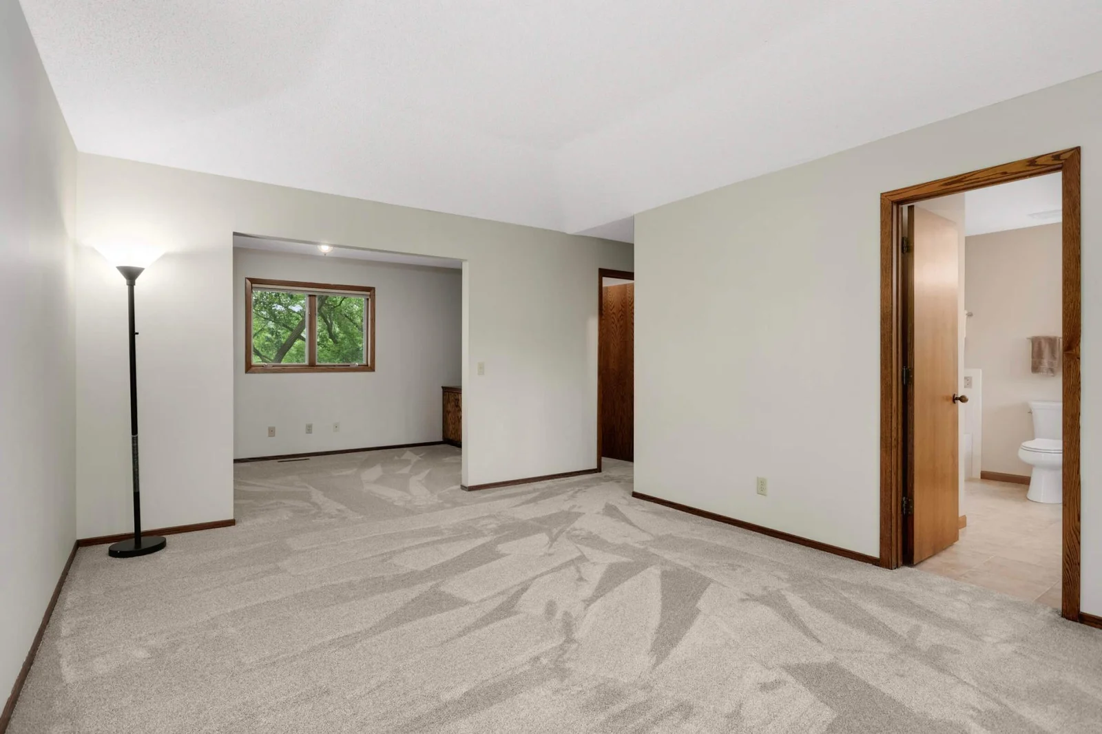 Primary bedroom features dressing area/reading nook