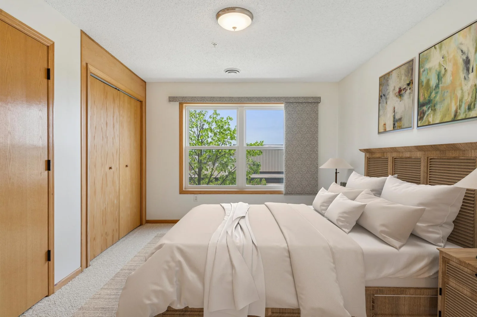 Virtually Staged Large Bedroom with great light.