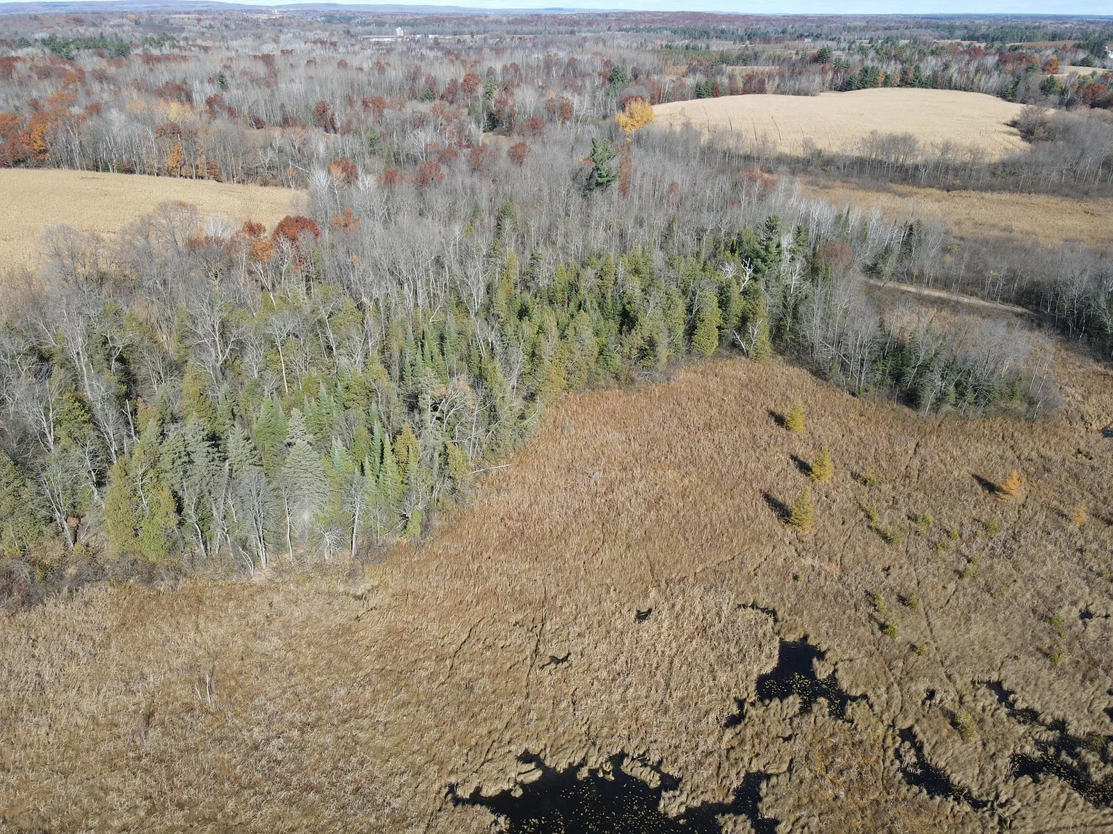 About 2/3 of the 22 acres is below the ordinary high water mark of Island Lake