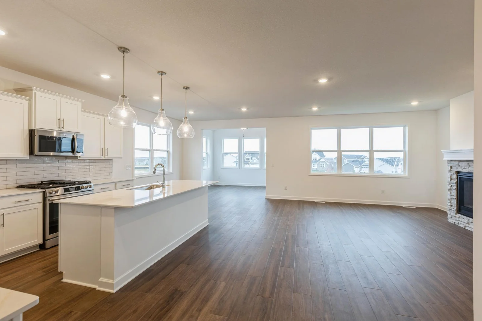 (Photo of similar home, features will vary) This open-concept layout is perfect for family gatherings.