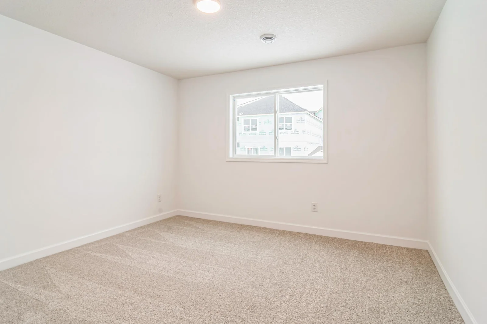(Photo of similar home, features will vary) The lower level bed.